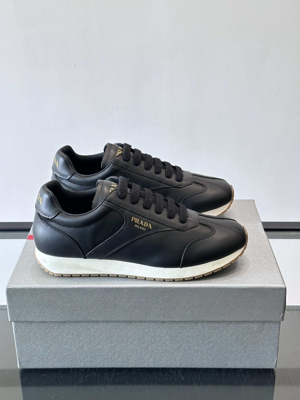 Prada Men's Black Low-Top Sneakers - Black Upper With White And Tan Accents